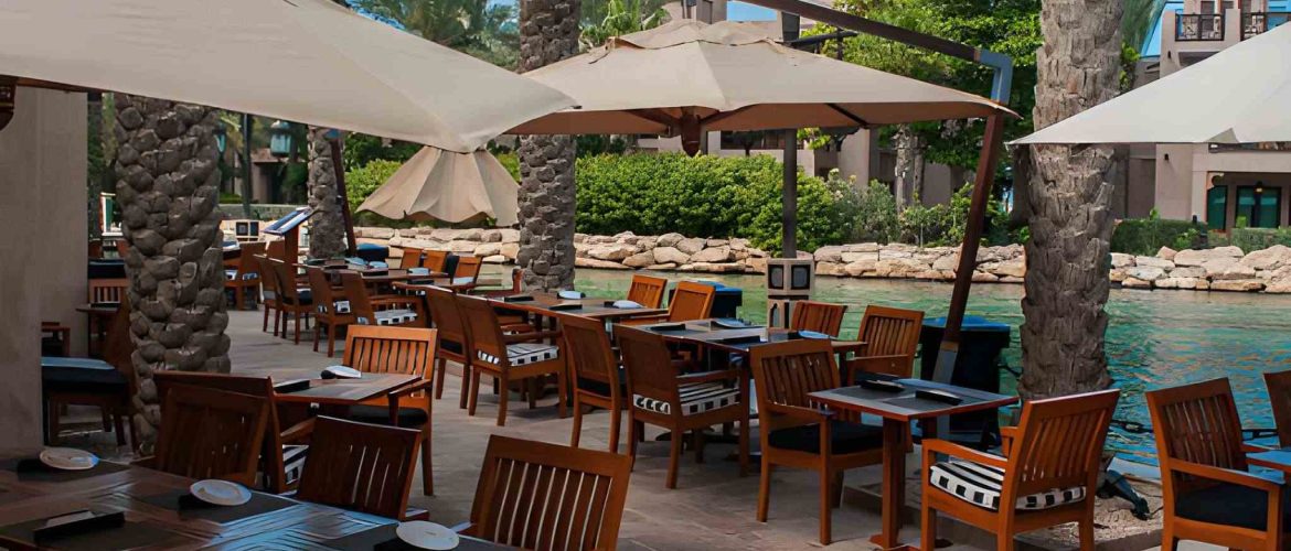 Pergola shades enhancing luxury outdoor dining in Dubai