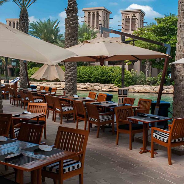 Pergola shades enhancing luxury outdoor dining in Dubai